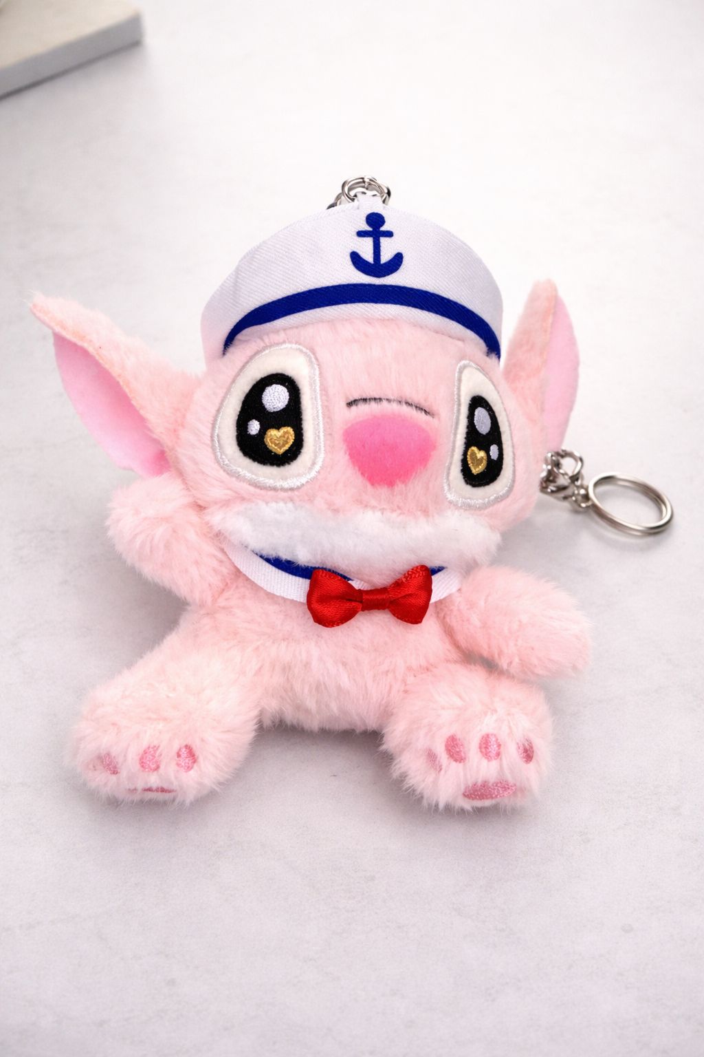 llavero stitch y angel marinero - amplitudmodulada